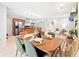 Open concept layout connecting the dining room to the kitchen, creating a seamless flow for entertaining at 9014 Holliday Dr, Indianapolis, IN 46260