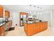 Well-equipped kitchen with island, stainless appliances, and seamlessly flowing design at 9014 Holliday Dr, Indianapolis, IN 46260