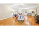 Bright living room with hardwood floors, featuring neutral decor and ample space for comfortable seating at 9014 Holliday Dr, Indianapolis, IN 46260