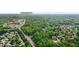 Aerial view of the home with proximity to nearby shops, restaurants and Fort Harrison State Park at 9834 Belcrest Ln, Indianapolis, IN 46256