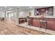 Basement bar area featuring stylish seating and wine storage at 9834 Belcrest Ln, Indianapolis, IN 46256