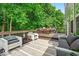 Multi-level deck area with both lounge and dining spaces, perfect for outdoor entertaining and relaxation at 9834 Belcrest Ln, Indianapolis, IN 46256