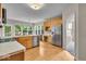 Kitchen with stainless appliances, eat-in table and hardwood floors at 9834 Belcrest Ln, Indianapolis, IN 46256