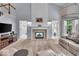 Bright, airy living room with fireplace and comfortable seating at 9834 Belcrest Ln, Indianapolis, IN 46256