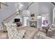 Open-concept living area with fireplace and ample natural light at 9834 Belcrest Ln, Indianapolis, IN 46256