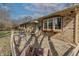 Brick patio area with natural light and access to house - perfect for entertaining guests outdoors at 10130 Central Ave, Carmel, IN 46280