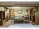 Functional basement space featuring a large table with craft supplies, storage units, and a neutral carpet at 10130 Central Ave, Carmel, IN 46280