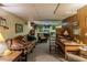 Spacious finished basement featuring a relaxed seating area, desk, and comfortable furniture for versatile living at 10130 Central Ave, Carmel, IN 46280
