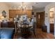 Cozy breakfast nook offers a charming table setting and seamless access to the kitchen at 10130 Central Ave, Carmel, IN 46280