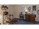 Cozy entryway featuring vintage decor, an antique table, and a classic wooden chair at 10130 Central Ave, Carmel, IN 46280