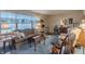 Relaxing living room featuring a comfortable sofa, vintage furnishings, and soft natural light at 10130 Central Ave, Carmel, IN 46280