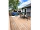 Outdoor deck with comfortable seating and a dining area perfect for entertaining at 10421 Sand Creek Blvd, Fishers, IN 46037