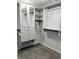 Spacious walk-in closet with custom shelving, drawers, and hanging rods for optimal organization at 10421 Sand Creek Blvd, Fishers, IN 46037