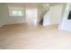 Bright living room featuring hardwood floors and a staircase leading to the second floor at 10501 Morning Song Dr, Fishers, IN 46038