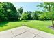 Beautiful, expansive backyard with lush green lawn, mature trees, patio, and a fire pit for enjoyment at 10519 Hyacinth Ct, Noblesville, IN 46060
