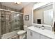 A well-lit bathroom with a glass-enclosed shower, white vanity, and modern fixtures at 10519 Hyacinth Ct, Noblesville, IN 46060