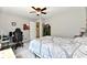 This bedroom features a computer desk, gaming chair, and lots of natural light at 10519 Hyacinth Ct, Noblesville, IN 46060