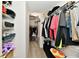 A neatly organized walk-in closet with ample storage space and visible shelving at 10519 Hyacinth Ct, Noblesville, IN 46060