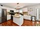Updated kitchen with white cabinets, stainless steel appliances, and granite countertops, offering a modern design at 10519 Hyacinth Ct, Noblesville, IN 46060