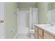 Bathroom featuring a shower-tub combination and a vanity sink at 11036 Ravenna Way, Indianapolis, IN 46236