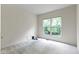 Cozy carpeted bedroom with window at 11036 Ravenna Way, Indianapolis, IN 46236