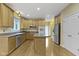 Bright kitchen featuring stainless steel appliances, wood cabinets, and hardwood floors at 11036 Ravenna Way, Indianapolis, IN 46236