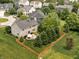 Beautifully landscaped property showcasing a spacious backyard with a lovely outdoor entertaining area at 1237 Wolcott Ct, Westfield, IN 46074
