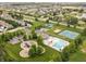 Aerial view of the neighborhood featuring community pool, playground, and tennis courts at 1237 Wolcott Ct, Westfield, IN 46074