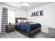This bedroom is decorated with a Jack theme and a baseball accent pillow at 1237 Wolcott Ct, Westfield, IN 46074