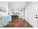 Open dining area featuring hardwood floors, neutral walls, and a dining table with seating for six at 1237 Wolcott Ct, Westfield, IN 46074