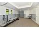 Spacious finished basement featuring a gym and workout area at 12380 Creekwood Ln, Carmel, IN 46032