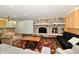 Finished basement with stone fireplace, bar, and stylish living area at 12380 Creekwood Ln, Carmel, IN 46032