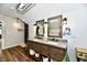 Rustic bathroom vanity offers dual sinks, ample storage, and stylish mirrors at 12380 Creekwood Ln, Carmel, IN 46032