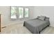 Bright bedroom with lots of natural light and simple decor at 12380 Creekwood Ln, Carmel, IN 46032