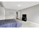 Spacious bedroom with neutral walls, carpet flooring, a bed, and built in shelves at 1264 Black Oak Dr, Greenwood, IN 46143