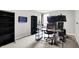 Bedroom view features a work station, storage shelves, neutral carpeting and gray walls at 1264 Black Oak Dr, Greenwood, IN 46143