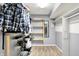 Well-organized walk-in closet with built-in shelving offers ample storage space at 1264 Black Oak Dr, Greenwood, IN 46143