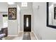 Bright foyer featuring hardwood floors, high ceilings, and decorative accents at 1264 Black Oak Dr, Greenwood, IN 46143