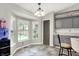 Eat in kitchen area with views to the backyard and updated gray kitchen cabinets and countertops at 1264 Black Oak Dr, Greenwood, IN 46143
