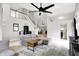 Cozy living room with vaulted ceilings, neutral walls, and modern decor, creating an inviting and stylish space at 1264 Black Oak Dr, Greenwood, IN 46143