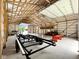 Spacious barn interior with high ceilings and exposed wood framing, ideal for storage, workshop or hobby space at 1412 10Th St, Danville, IN 46122
