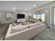 Spacious living room with a large sectional sofa, media center, and natural light at 1412 10Th St, Danville, IN 46122