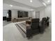 Spacious living room featuring a large TV, comfortable seating, and modern decor at 1412 10Th St, Danville, IN 46122