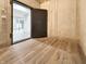 The well-designed safe room provides security with sturdy reinforced walls and offers solid wood flooring at 1412 10Th St, Danville, IN 46122