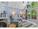 Cozy living room with vaulted ceilings, a large window, and comfortable seating at 1413 N Lost Lake Rd, Columbus, IN 47201