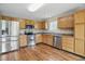 Well-equipped kitchen with stainless steel appliances, wooden cabinets, and lots of countertop space at 15523 Follow Dr, Noblesville, IN 46060
