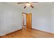 Bedroom with hardwood floors and neutral walls provides relaxing space at 1613 Park Rd, Anderson, IN 46011
