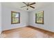 Spacious bedroom with hardwood floors and bright natural light at 1613 Park Rd, Anderson, IN 46011
