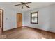 Bedroom with hardwood floors, a closet, and natural light from the window at 1613 Park Rd, Anderson, IN 46011
