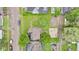Aerial view of the property showcasing the landscaping, driveway, and surrounding neighborhood at 1618 Villa Ave, Indianapolis, IN 46203